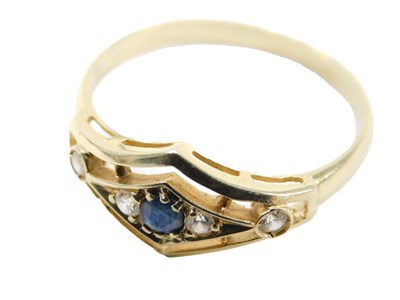 Lot 780 - A sapphire and diamond dress ring, the shaped...