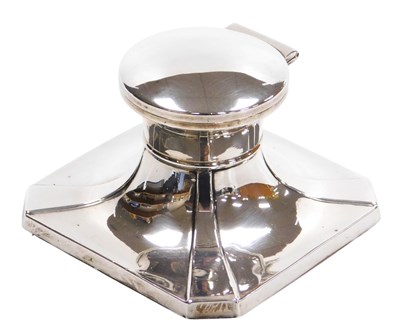 Lot 111 - A George V silver capstan inkwell, of canted,...