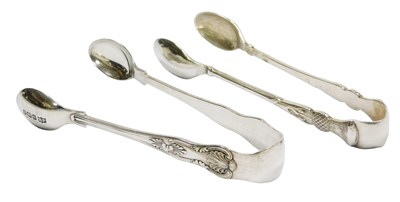 Lot 113 - A pair of George V silver sugar tongs, with...