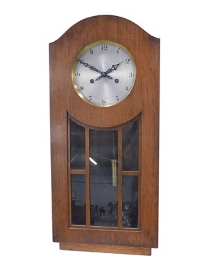 Lot 873 - A 20thC Enfield wall clock, with a stainless...