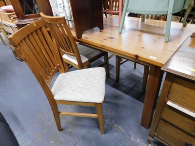 Lot 1505 - A pine dining table, the rectangular top...