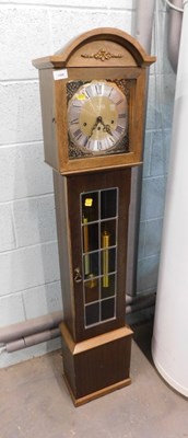 Lot 1508 - A grandmother clock, the silvered dial bearing...