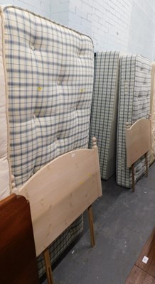 Lot 1518 - Two single beds, comprising two pine style...