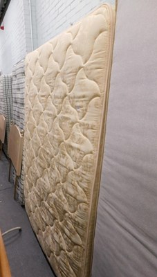 Lot 1519 - A small double bed, comprising upholstered...