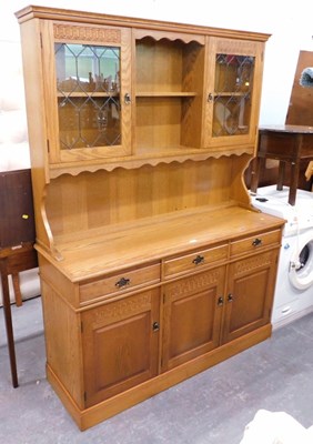 Lot 1529 - An oak dresser, the top with two shelves...