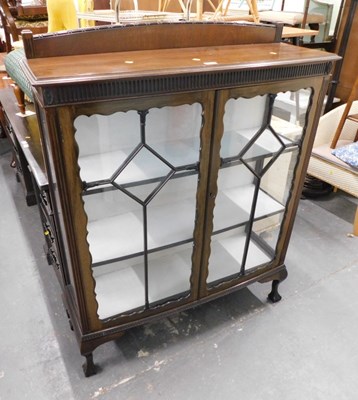 Lot 1534 - A mahogany display cabinet, the top with a...