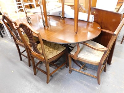 Lot 1554 - A mahogany dining room suite, comprising an...