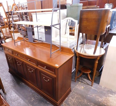 Lot 1559 - A 20thC sideboard, the top with a raised back...