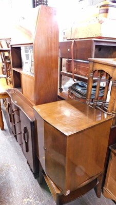Lot 1566 - A 1950s oak sideboard, together with a bureau,...