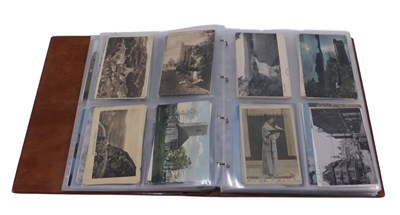 Lot 831 - A Royal Mail postcard album, and contents of...