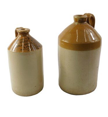 Lot 838 - Two stoneware bottles, comprising one...