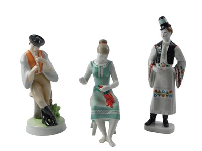 Lot 839 - Three Hollohaza Hungarian porcelain figures,...