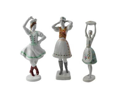 Lot 840 - Three Hollohaza Hungarian porcelain figures,...
