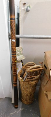 Lot 1596 - A didgeridoo, together with a wicker umbrella...