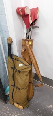 Lot 1597 - Various golf clubs, contained in a bag,...