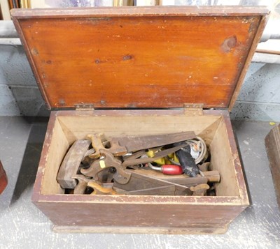 Lot 1606 - A stained pine tool chest, the hinged lid...