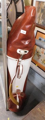 Lot 1609 - A golf bag, containing various golf clubs.