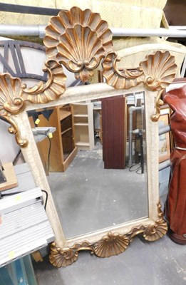 Lot 1610 - A wall mirror, with an ornate frame, the top...