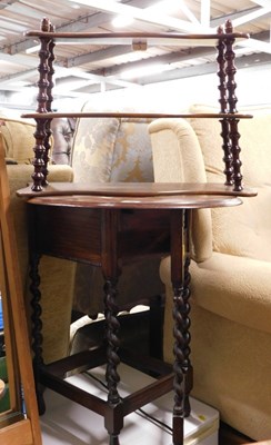 Lot 1626 - An oak sewing table, raised on barley twist...