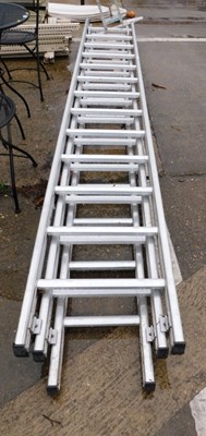 Lot 1672 - A metal extending ladder, together with a...