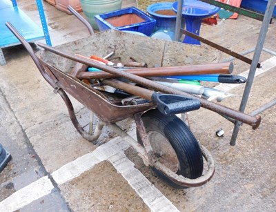 Lot 1685 - A wheelbarrow, containing various garden and...