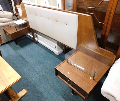 Lot 1706 - A 1970s double headboard, with integrated side...