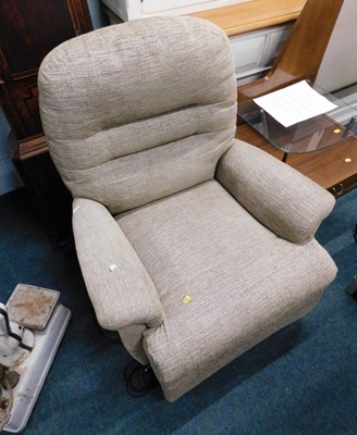 Lot 1708 - A Sherborne electric rise and fall armchair.