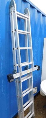 Lot 1687 - A folding aluminium roof ladder with rubber...