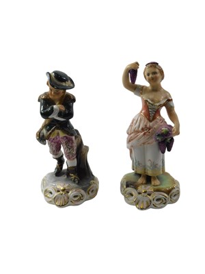 Lot 900 - A pair of Royal Crown Derby porcelain figures,...