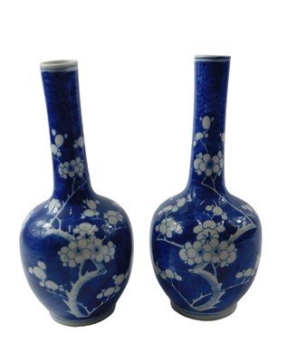 Lot 912 - A pair of 19thC Chinese porcelain bottle vases,...