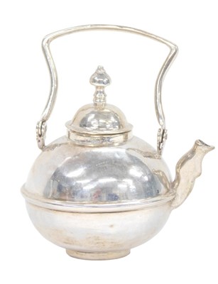 Lot 78 - A Dutch silver miniature teapot, of compressed...