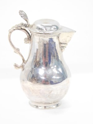 Lot 192 - A Dutch silver miniature lidded jug, with...