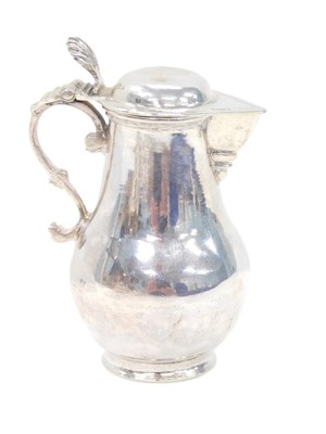 Lot 192 - A Dutch silver miniature lidded jug, with...