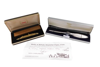Lot 979 - A cast metal paperknife, modelled in the form...