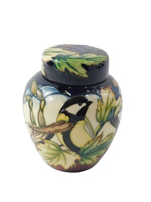 Lot 909 - A Moorcroft pottery Inglewood pattern jar and...