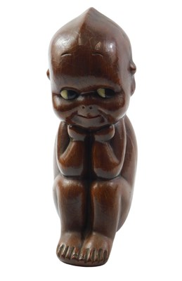 Lot 915 - After Alberto Leni. A carved wooden Kewpie...