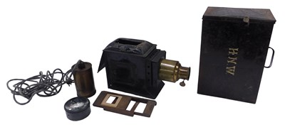 Lot 929 - A black painted tinplate and brass magic...