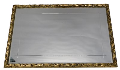 Lot 1039 - A gilt wall mirror, with engraved plate, 94cm...