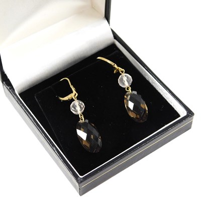 Lot 211 - A pair of smoky quartz and clear quartz drop...