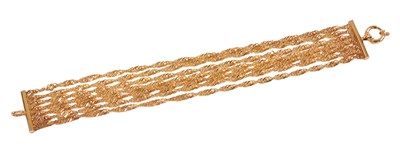 Lot 219 - A 9ct rose gold seven-strand curb link...