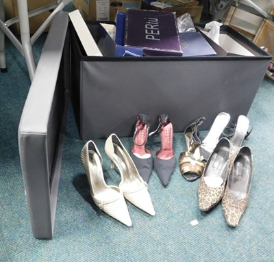 Lot 2250 - A leatherette ottoman, containing lady's shoes,...