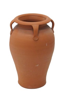 Lot 1069 - A four handled terracotta olive jar, 56cm high.