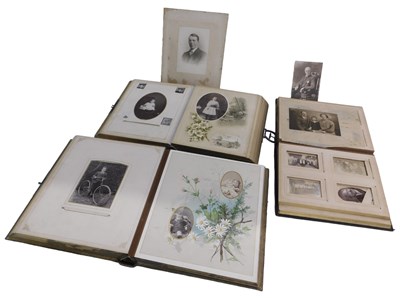 Lot 1128 - Three Victorian leather bound photograph...