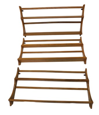 Lot 1167 - Three Ercol light coloured elm two tier plate...