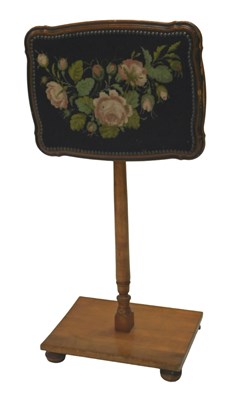 Lot 1178 - A beech pole screen, with a floral woolwork...