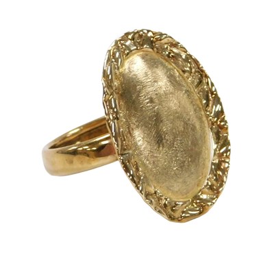 Lot 412 - A Milor oval dress ring, with a textured...