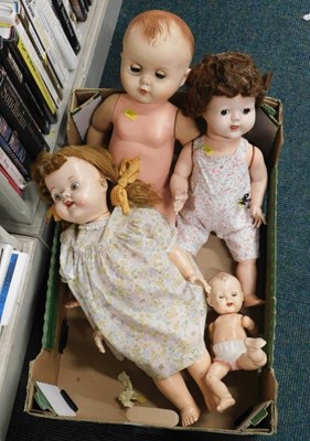 Lot 2276 - Three late 20thC plastic dolls, all with...