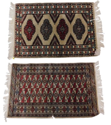 Lot 1191 - Two similar Pakistani Afghan type rugs, each...