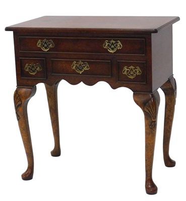 Lot 1203 - A burr elm lowboy, the cross banded...