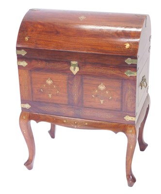 Lot 1209 - An Eastern hardwood brass and copper inlaid...